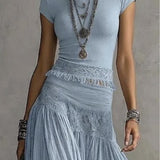CONJUNTO DE TOP DE ENCAGE CON PANEL Y FALDA MAXI PLISADA