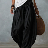 Conjunto de Top Blanco Hombros Descubiertos y Pantalones Acampanados Holgados