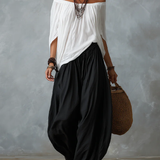 Conjunto de Top Blanco Hombros Descubiertos y Pantalones Acampanados Holgados
